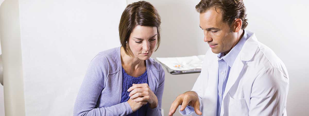Woman with doctor